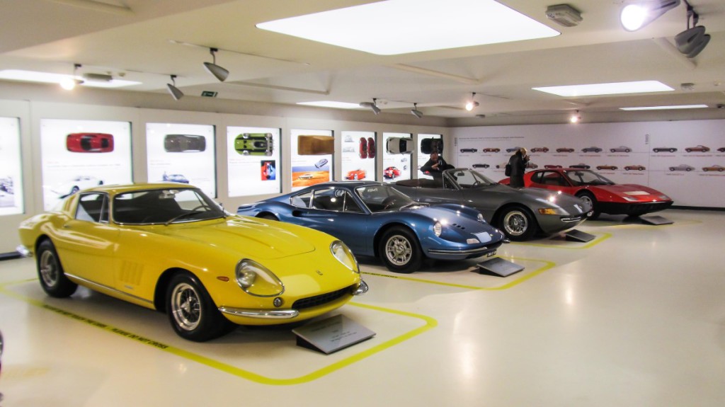 Top floor of the museum with a range of cars from old to today.