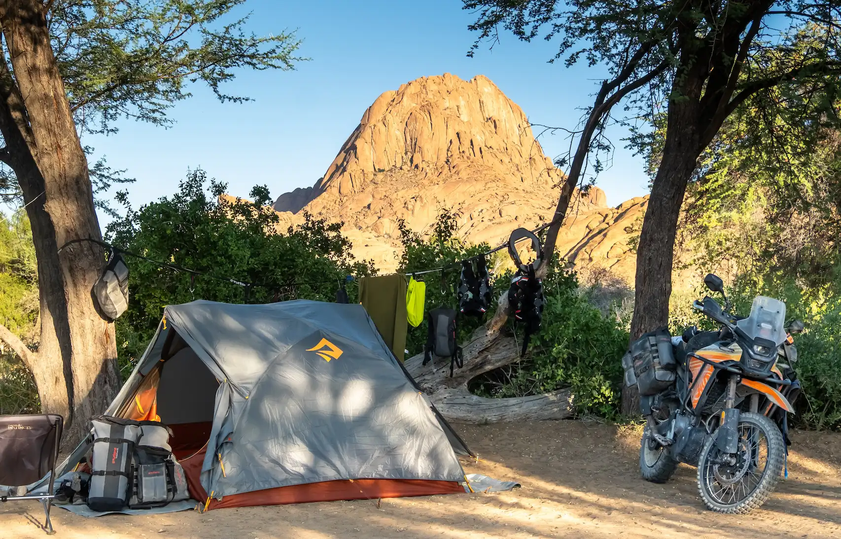 A good motorcycle camping tent needs to pack small and light while still offering enough space and weather protection for long-distance travel. Lightweight backpacking tents can work particularly well for adventure motorcycle touring.